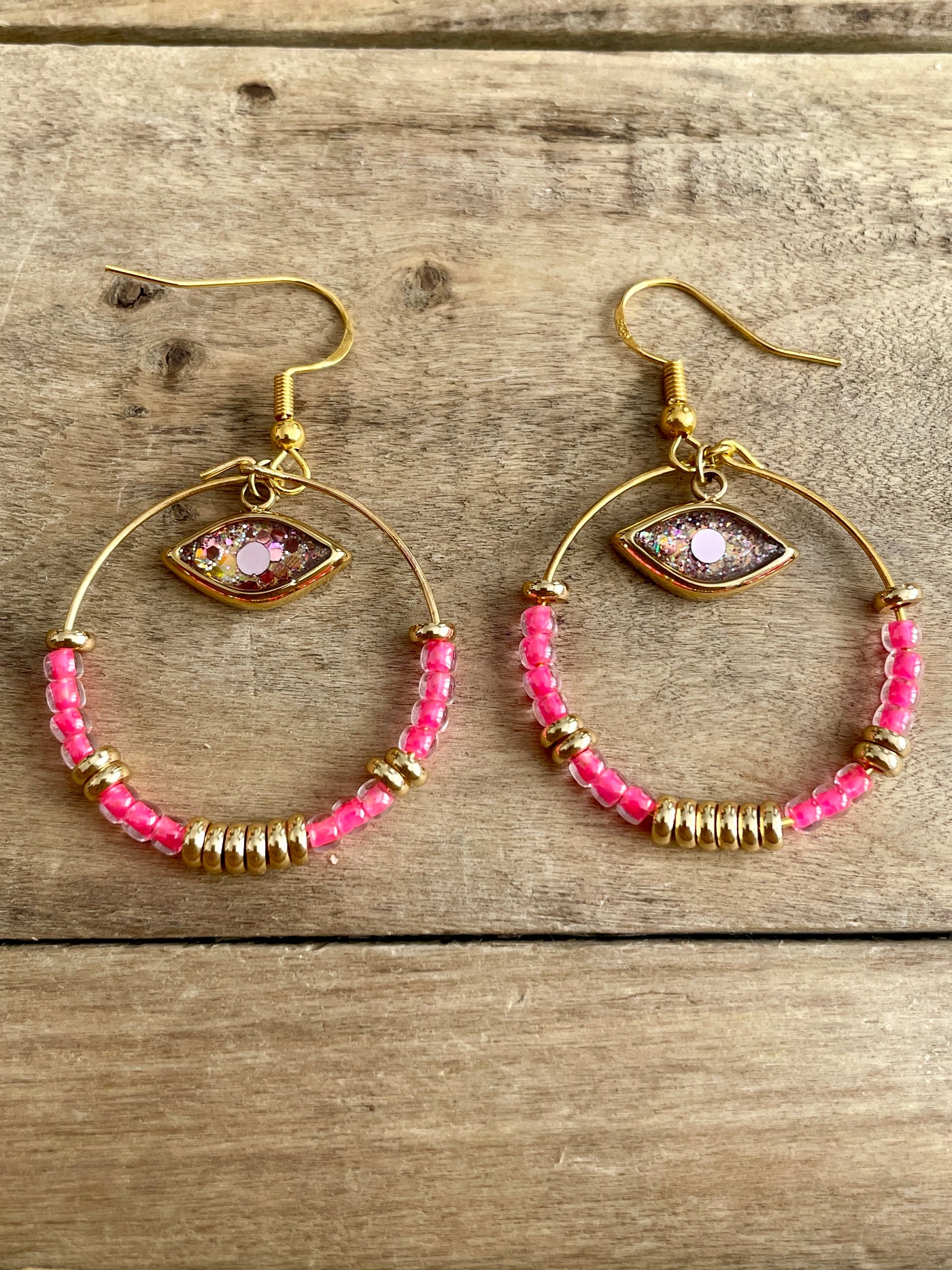 Boucles d'oreilles dorées NEON  Féminin sacré