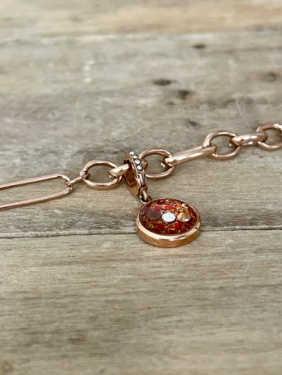 Charm Cristal or rose Om(vendu sans bracelet)