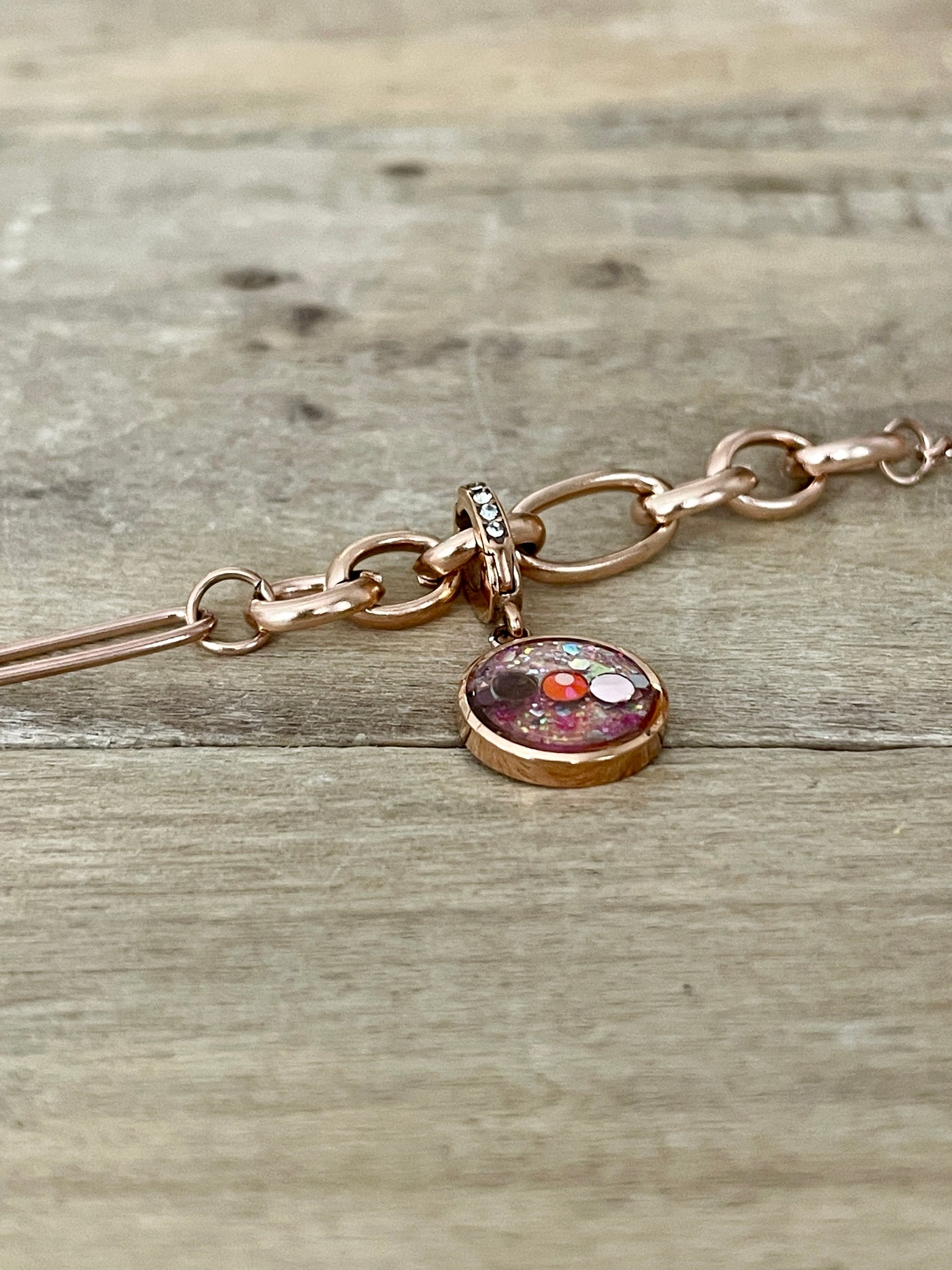 Charm Cristal or rose Phenix (vendu sans bracelet)