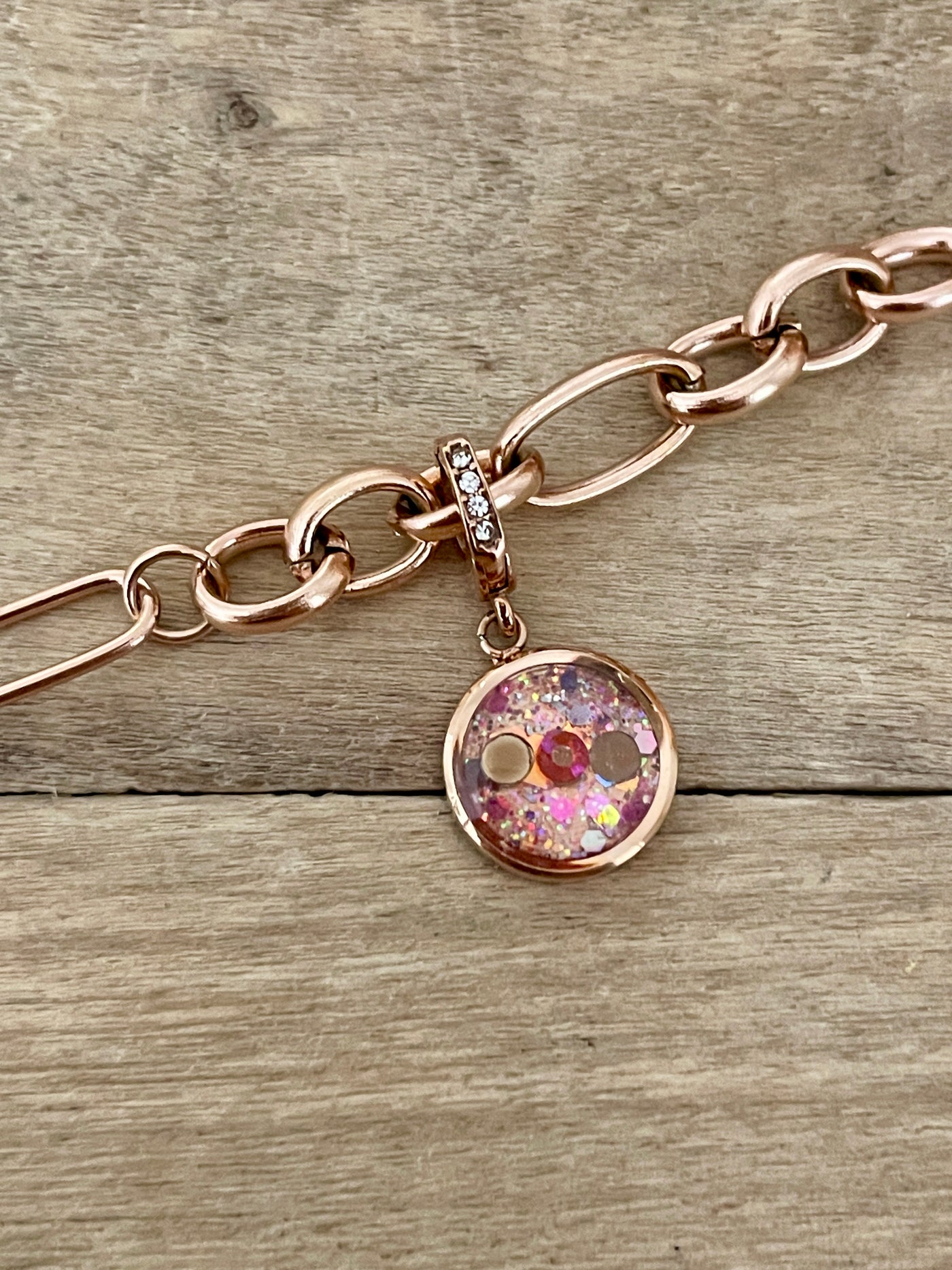 Charm Cristal or rose Phenix (vendu sans bracelet)