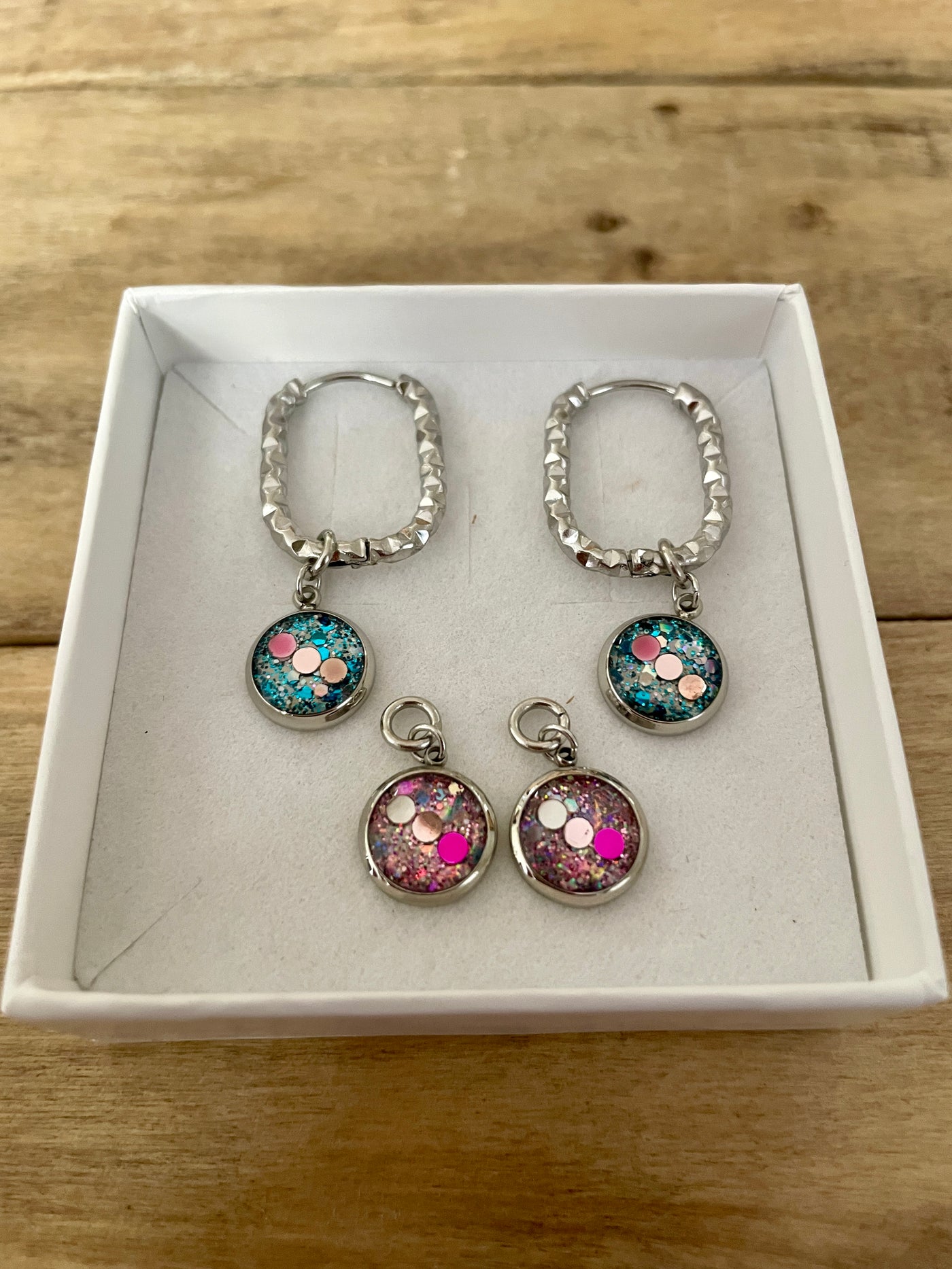 Boucles d'oreilles argentées SANTORINI Déblocage du noeud du moment