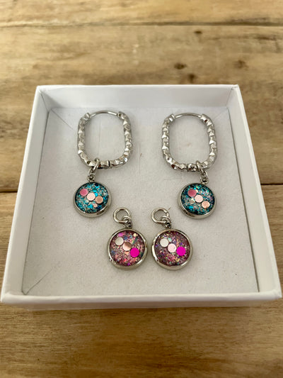 Boucles d'oreilles argentées SANTORINI Déblocage du noeud du moment