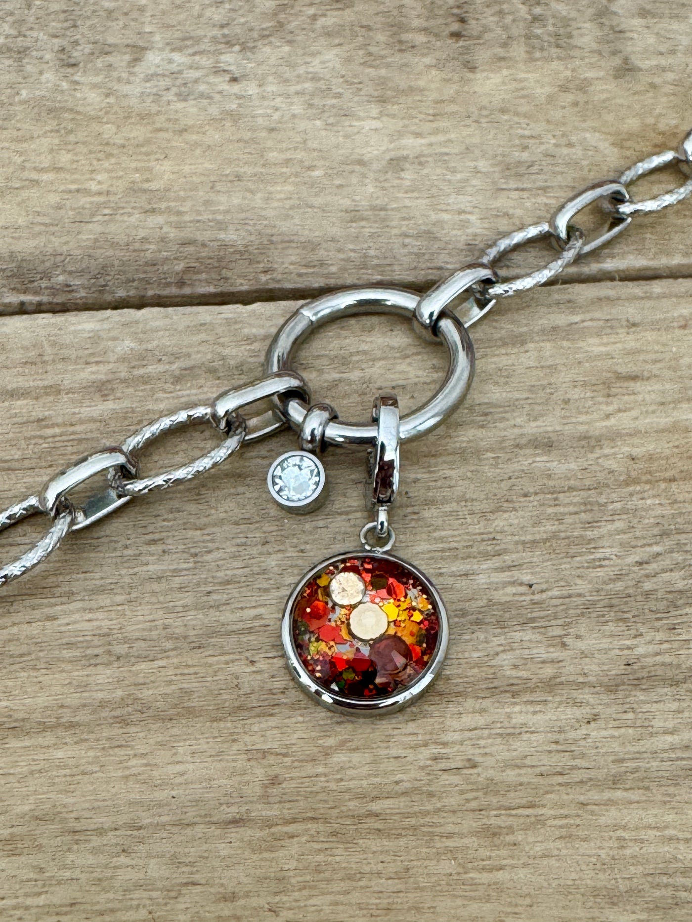 Charm argenté Blessure d'Abandon (vendu sans bracelet)