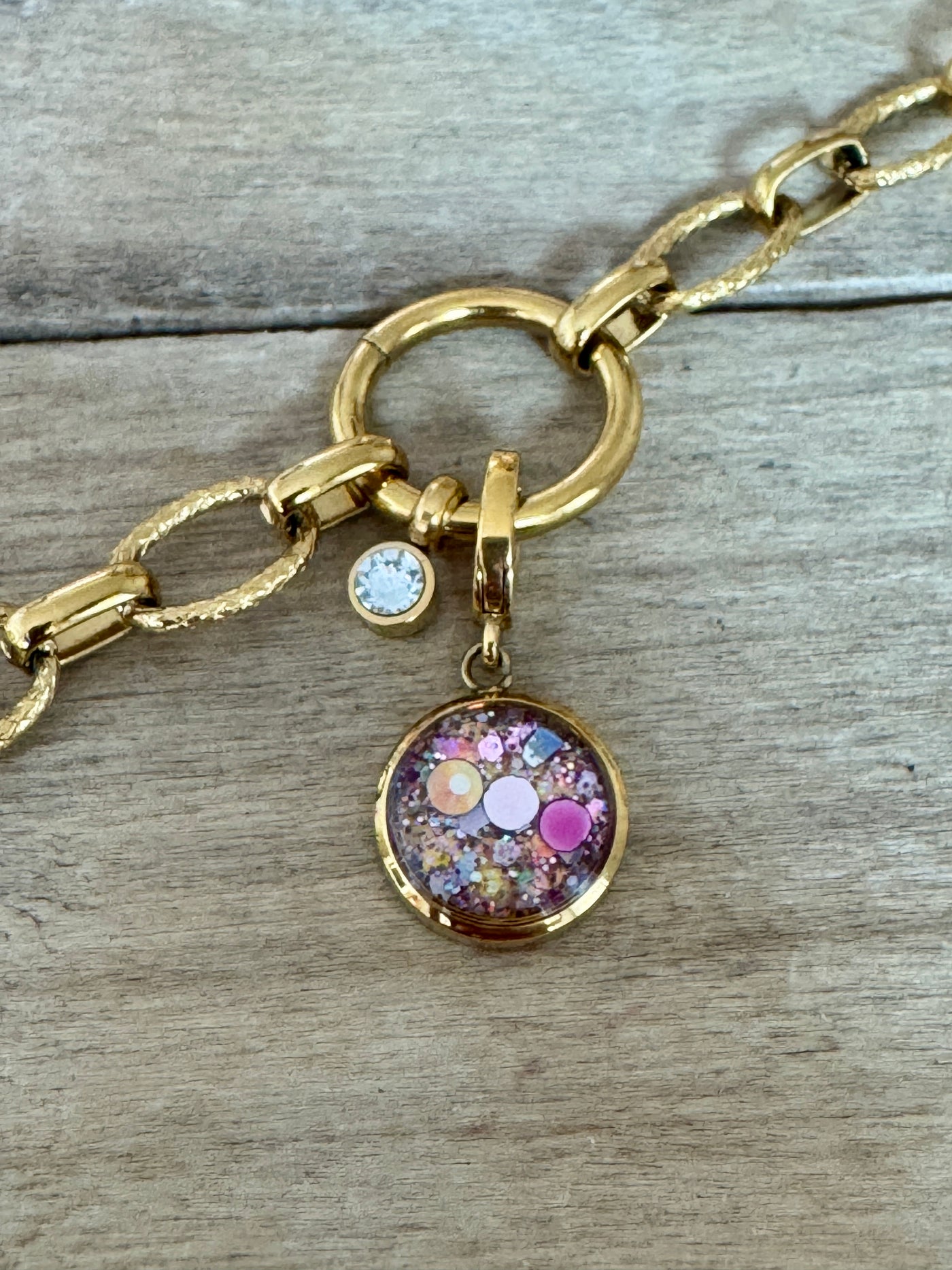 Charm doré Procréation (vendu sans bracelet)